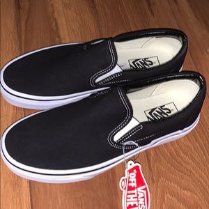 Brand new black and white slip on vans